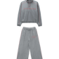 Gray tracksuit with red accents on a white background