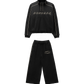 Black tracksuit with 'Dondada' branding on a white background